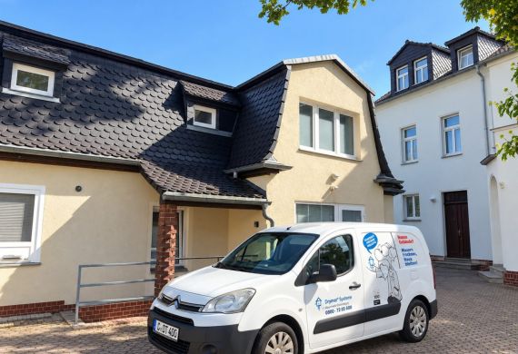 Mehrfamilienhaus in Leipzig mit Naturstein- und Ziegelmauerwerk – Drymat Referenz